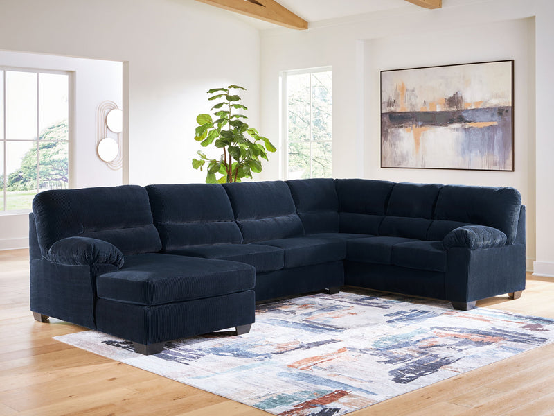 Signature Design by Ashley SimpleJoy stationary sectional sofa with plush cushions and modern design in a neutral fabric.