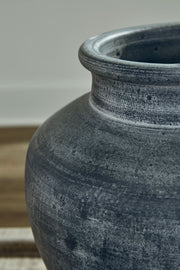 12-inch ceramic vase from the Meadie collection by Signature Design by Ashley, featuring a sleek, modern design perfect for decor.