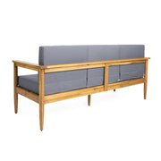 Dark gray outdoor 3-seater sofa with cushions and teak Acacia wood frame by Noble House.