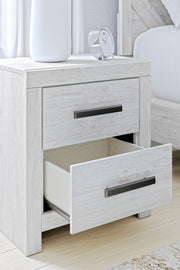 Whitewash Cayboni two-drawer night stand by Signature Design Ashley, showcasing its accent nightstand style with wood finish and drawers