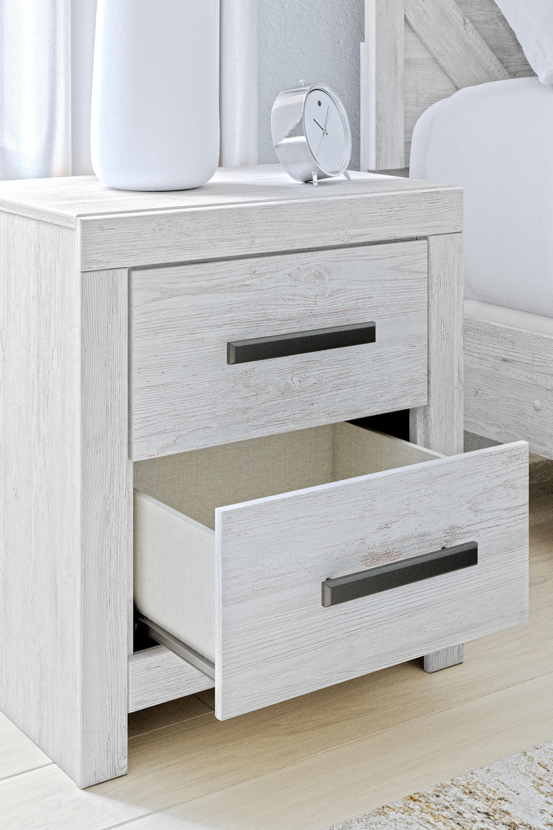 Whitewash Cayboni two-drawer night stand by Signature Design Ashley, showcasing its accent nightstand style with wood finish and drawers