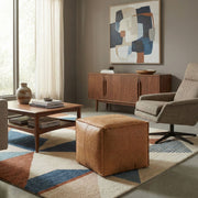 Simpli-Home Brody square accent pouf with soft fabric cover and plush cushioning, ideal for versatile seating or decorative use.