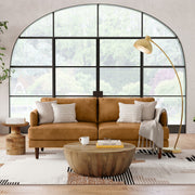 Livingston upholstered stationary sofa by Simpli-Home with plush fabric, cushioned back, and wooden legs in a cozy living room setting.