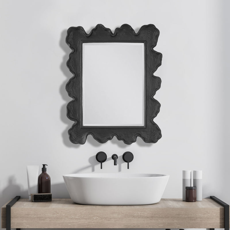 Uttermost Sea Coral wall mirror featuring a coral-inspired design with a round frame, suitable for coastal or nautical decor.