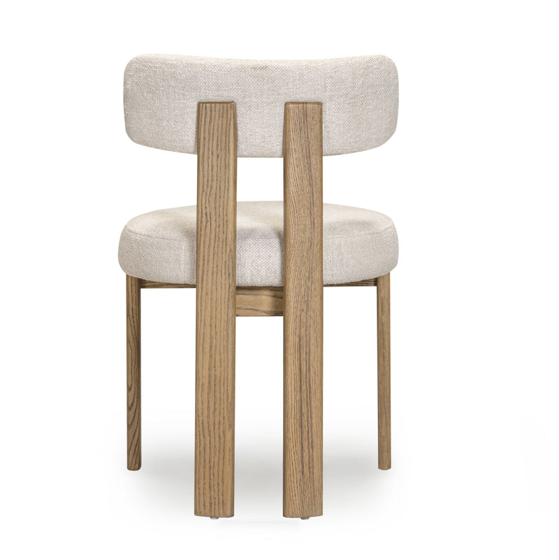 TOV Furniture Odessa dining side chair with upholstered seat and wooden legs, modern design for kitchen or dining room.