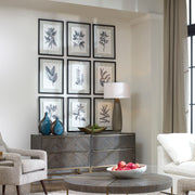Set of nine Uttermost farmhouse floral framed prints with black frames, featuring vintage botanical illustrations on a neutral background.