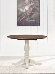 Wirloni - Round Dining Room Drop Leaf Table - Antique White / Brown - R&R Furniture Gallery (Fountain Valley, CA)