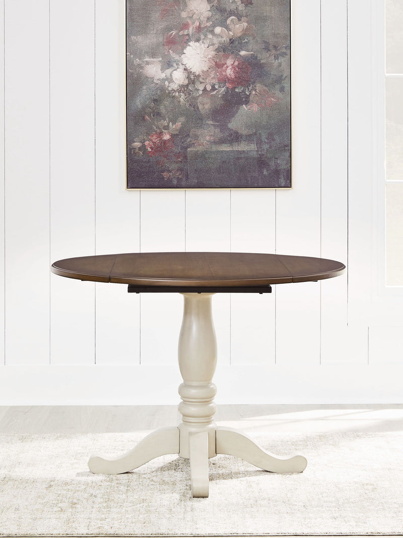 Wirloni - Round Dining Room Drop Leaf Table - Antique White / Brown - R&R Furniture Gallery (Fountain Valley, CA)