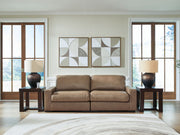 Benchcraft Veronella stationary sectional sofa with plush cushions and fabric upholstery in a modern living room setting.