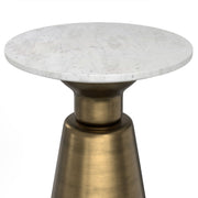 Leyla side table by Simpli-Home in antique brass with a sleek, modern design and a round tabletop.
