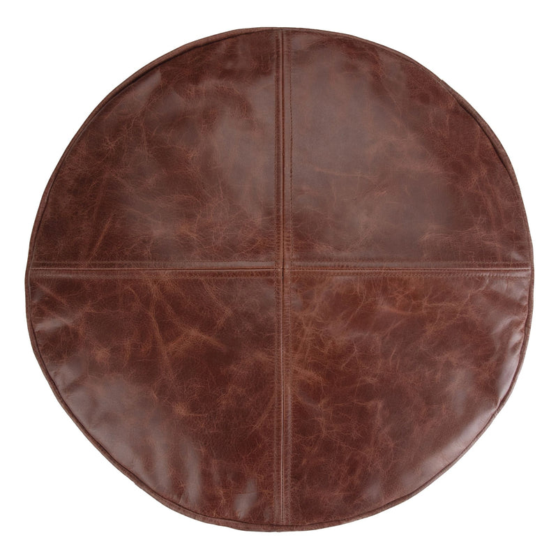 Simpli-Home Connor handcrafted round accent pouf with textured fabric and plush cushioning, suitable for living room or seating areas.