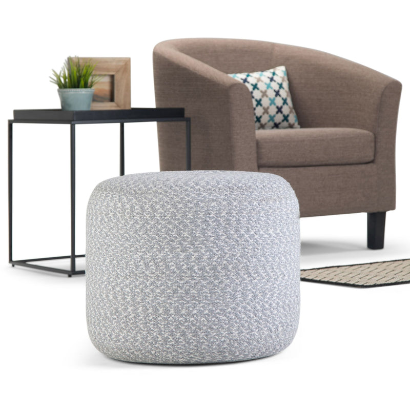 Round braided fabric accent pouf by Simpli-Home, versatile and stylish, perfect for living room or seating area.