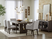 Signature Design by Ashley 8-piece dining room set with wooden table and matching chairs, perfect for family gatherings.