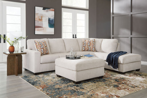 Signature Design by Ashley Aviemore 3-piece sectional living room set with plush cushions and modern design.