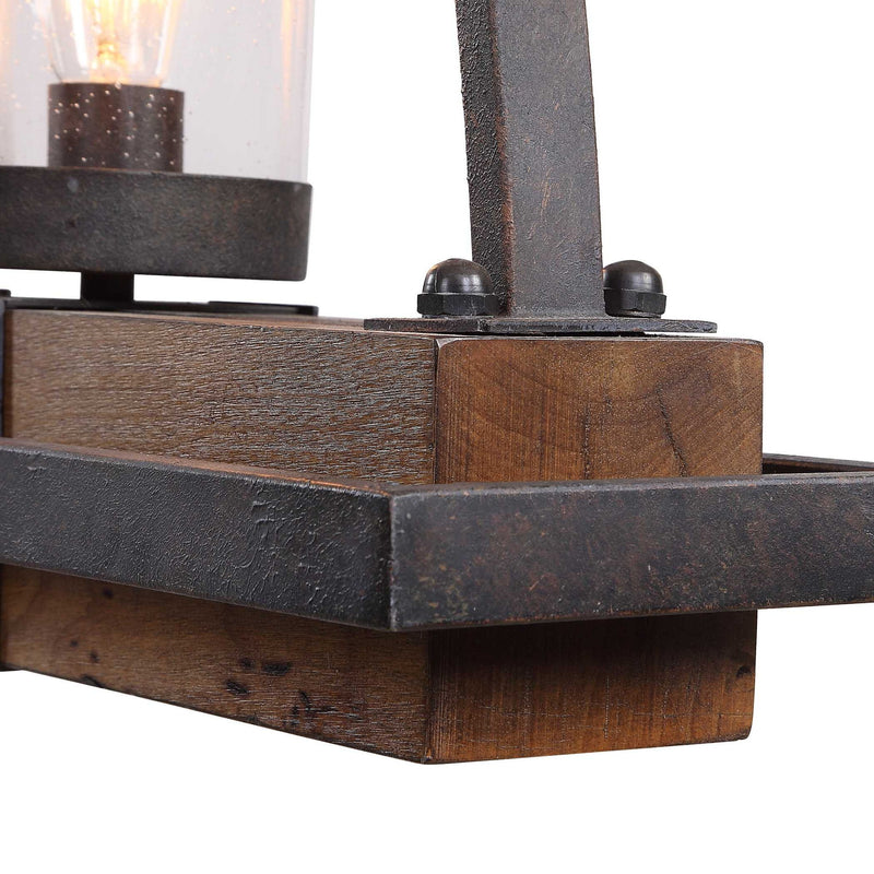 Uttermost Atwood 5-light rustic linear pendant chandelier with light brown finish and iron frame, ideal for modern farmhouse lighting.
