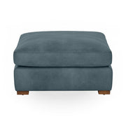 Classic Home Audrey upholstered ottoman with cushioned top and wooden legs, perfect for living room or bedroom decor