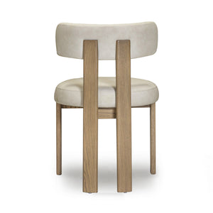 TOV Furniture Odessa dining side chair with upholstered seat and wooden legs, modern design for dining rooms.