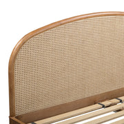 Rattan panel bed by TOV Furniture featuring a natural finish and sleek design, showcasing the sturdy rattan frame and headboard.