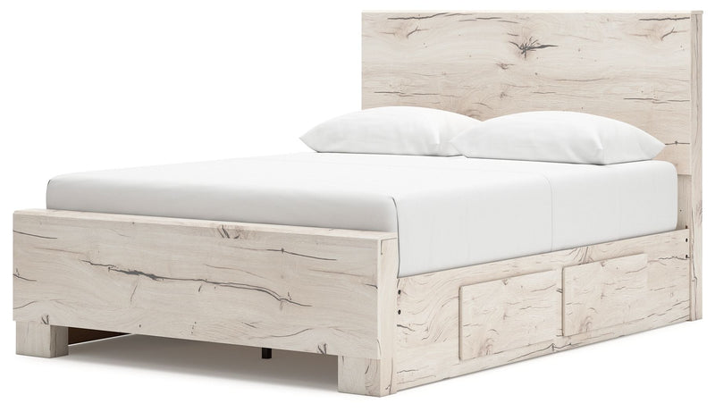Signature Design by Ashley Lawroy panel bed with built-in storage drawers, showcasing a modern bedroom furniture piece.