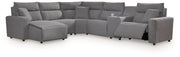 Signature Design by Ashley Modmax II reclining sectional in salt and pepper fabric with plush cushions and reclining seats.