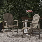 Pair of Noble House outdoor weather-resistant acacia wood Adirondack dining chairs set for patio or garden seating.