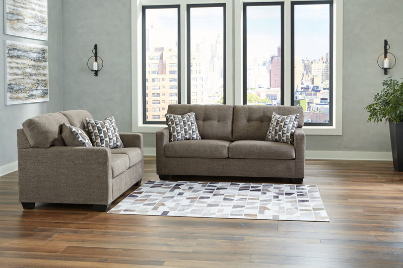 Signature Design by Ashley Mahoney living room set with stationary sofas and loveseats, featuring plush cushions and modern fabric upholstery.