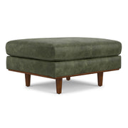 Simpli-Home Morrison handcrafted upholstered ottoman with beige fabric and wooden legs, serving as a stylish accent piece.