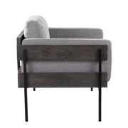 Lumi Source Kari farmhouse accent chair with wooden legs and cushioned seat in a cozy, rustic style.