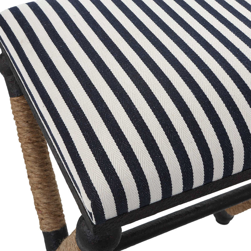 Black backless counter stool by Uttermost with a sleek design, suitable for counter height seating, 24-27 inches tall.