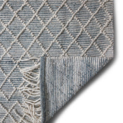Simpli-Home Ogden ivory 6' x 9' area rug with intricate woven pattern, perfect for living room or bedroom decor.