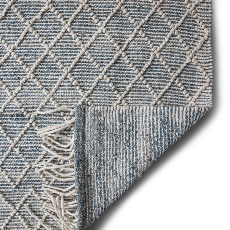 Simpli-Home Ogden ivory 6' x 9' area rug with intricate woven pattern, perfect for living room or bedroom decor.