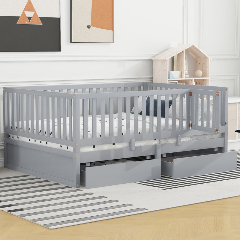 DreamHaus storage daybed with fence guardrails and two drawers, split into floor bed and daybed, showcasing its versatile design.