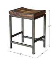 Counter height industrial bar stool by Uttermost with metal frame and wooden seat, perfect for modern industrial interior decor.