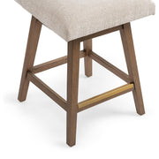 Classic Home Ava swivel counter stool in vanilla oat fabric with wooden legs, designed for 24-27 inch counter height.