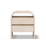 White washed Dune side table by Jennifer Taylor Home with a sleek, modern design and smooth finish.