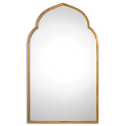 Uttermost Kenitra arched mirror with a sleek, modern frame, reflecting a stylish home interior.