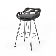 Outdoor rattan bar chair with metal legs from Noble House, part of a stylish stool set, featuring a woven rattan seat and sturdy metal frame.