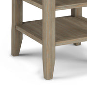 Handcrafted Acadian end table by Simpli-Home with a natural wood finish and simple design, perfect for living room or bedroom decor.