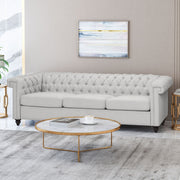 Noble House Chesterfield style 3-seater sofa with deep button tufting, showcasing classic design and plush upholstery.
