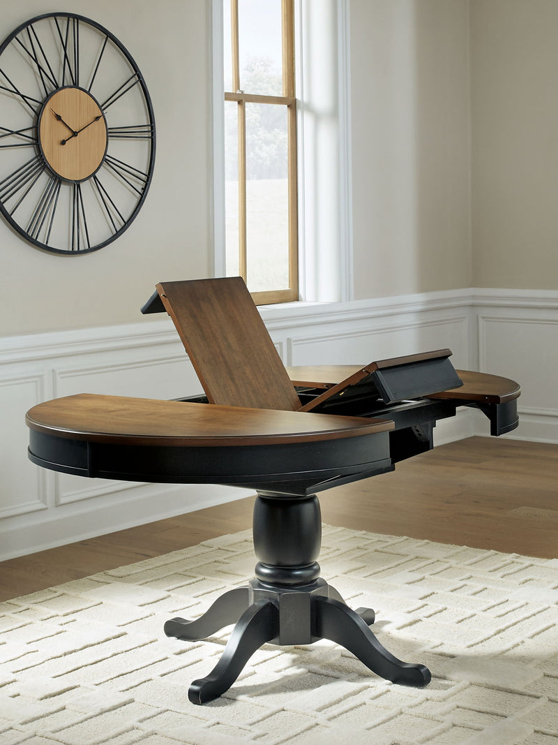Clorazi - Oval Dining Room Butterfly Extension Table - Black / Brown - R&R Furniture Gallery (Fountain Valley, CA)
