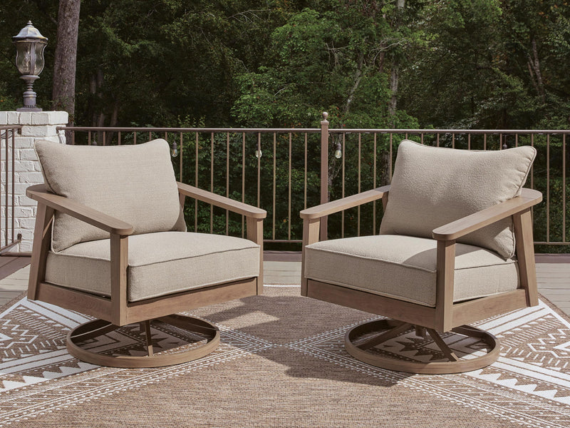 Signature Design by Ashley Harmony Headlands swivel lounge chair with cushion in natural and gray fabric, featuring a modern design.