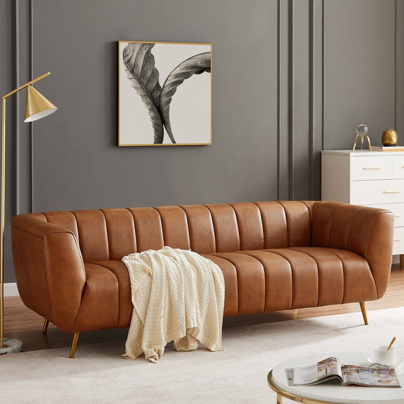 Ashcroft Furniture Ava sofa in gold and tan with a stationary design, featuring plush cushions and elegant upholstery.