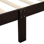 DreamHaus platform bed frame with sleigh design, wood slat support, and matching headboard and footboard in a modern bedroom setting.
