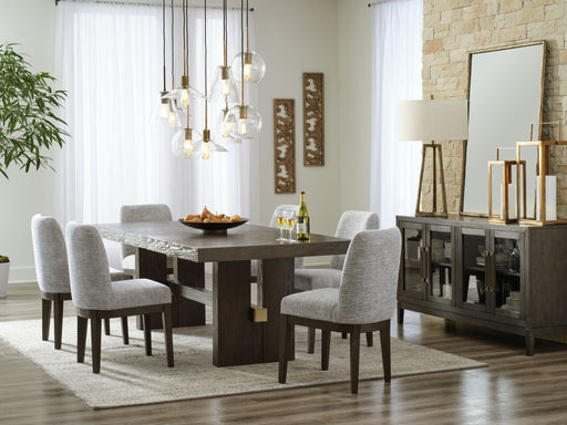 Signature Design by Ashley 8-piece dining room set with a wooden table and matching chairs in a modern dining space.