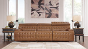 Signature Design by Ashley Temmpton Power Reclining Sectional with plush cushions and dark upholstered fabric.