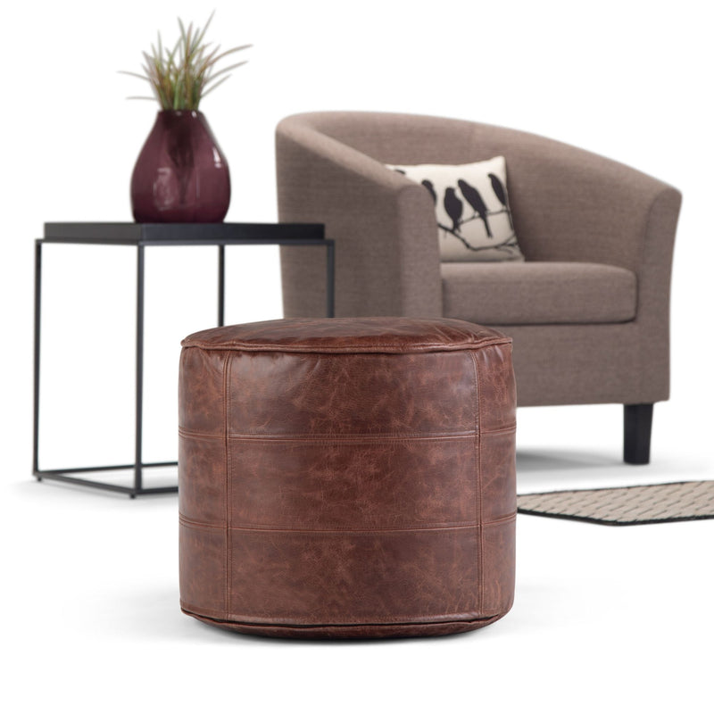 Simpli-Home Connor handcrafted round accent pouf with soft fabric and plush cushion, ideal for living room or seating areas.