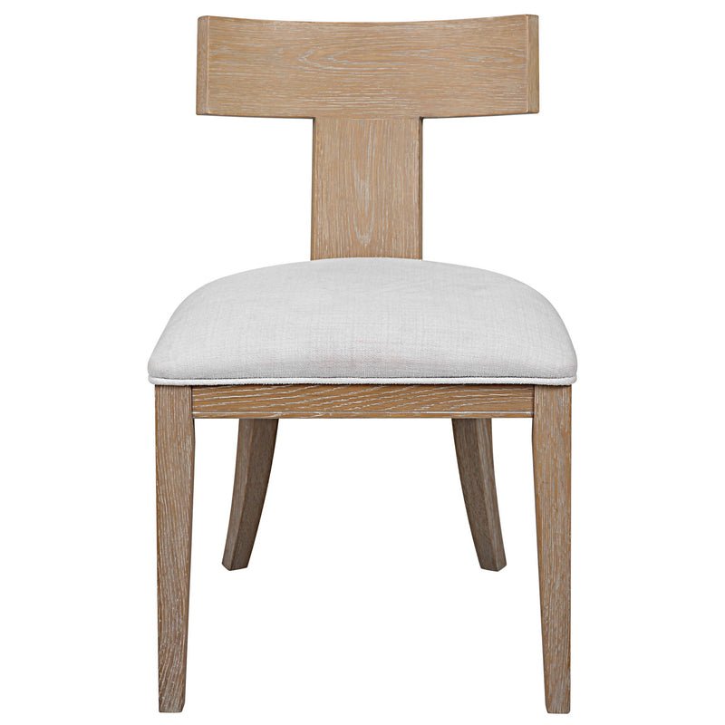 Uttermost Idris armless side chair with upholstered seat and wooden legs, modern design and neutral fabric for versatile decor.
