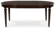 Lavinton - Oval Dining Room Extension Table - Brown - R&R Furniture Gallery (Fountain Valley, CA)