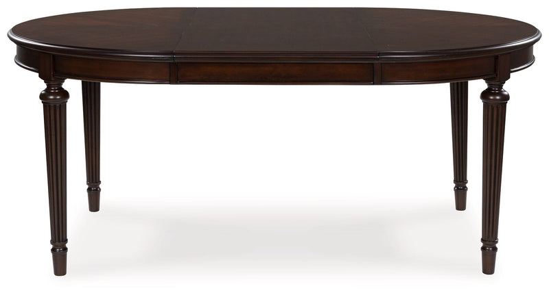 Lavinton - Oval Dining Room Extension Table - Brown - R&R Furniture Gallery (Fountain Valley, CA)