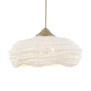 White beaded pendant light by Uttermost with five hanging lights and intricate bead design for modern pendant lighting.